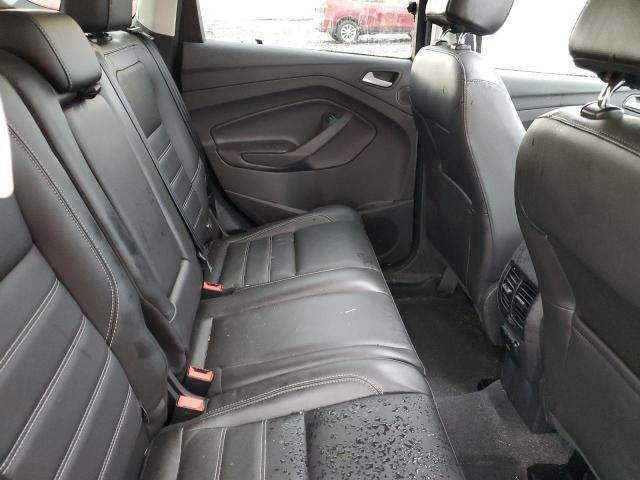 Photo 11 from auction – 2017 FORD ESCAPE TIT with VIN 1FMCU9J98HUB11656