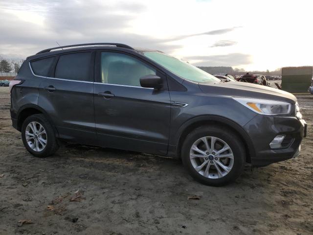 Photo 4 from auction – 2018 FORD ESCAPE SE with VIN 1FMCU0GD3JUC63003