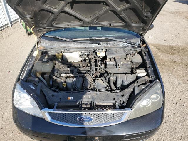 Photo 11 from auction – 2006 FORD FOCUS ZX4 with VIN 1FAFP34N06W113620