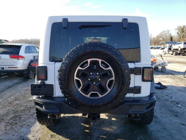 Photo 6 from auction – 2014 JEEP WRANGLER U with VIN 1C4BJWFG9EL279144
