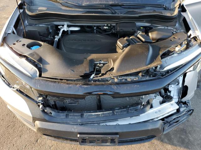 Photo 12 from auction – 2021 HONDA PASSPORT E with VIN 5FNYF8H56MB009941