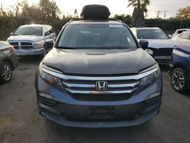 Photo 5 from auction – 2016 HONDA PILOT EXLN with VIN 5FNYF5H78GB014434