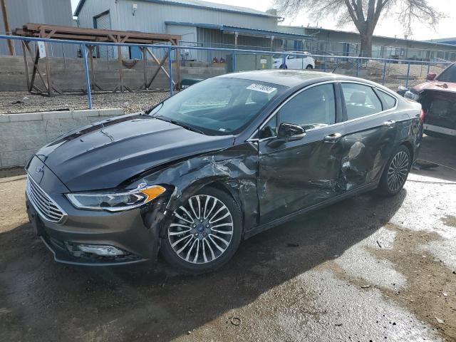 FORD FUSION TIT 2018 with VIN 3FA6P0D99JR128209 - Photo from auction
