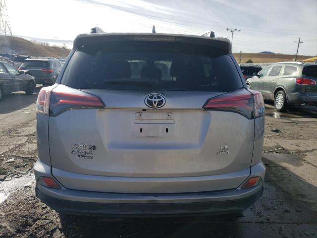 Photo 6 from auction – 2018 TOYOTA RAV4 LE with VIN 2T3BFREV8JW728436