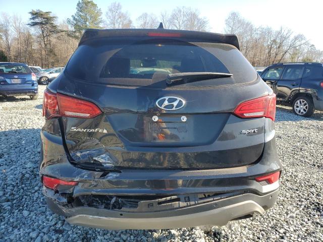 Photo 6 from auction – 2018 HYUNDAI SANTA FE S with VIN 5NMZU3LB2JH074676