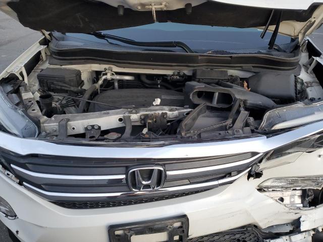Photo 12 from auction – 2018 HONDA PILOT LX with VIN 5FNYF6H18JB051900
