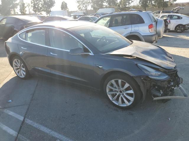 Снимка 4 от търг – 2018 TESLA MODEL 3 с VIN 5YJ3E1EA6JF020116