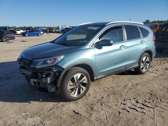 HONDA CR-V TOURI 2016 with VIN 5J6RM3H99GL010545 - Photo from auction
