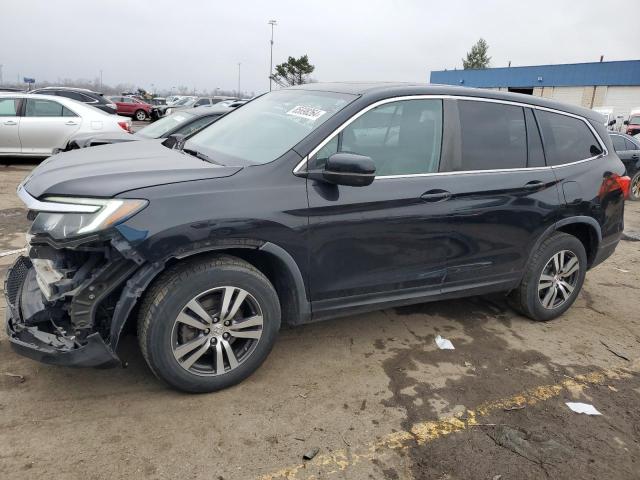 HONDA PILOT EXL 2016 with VIN 5FNYF6H59GB031604 - Photo from auction