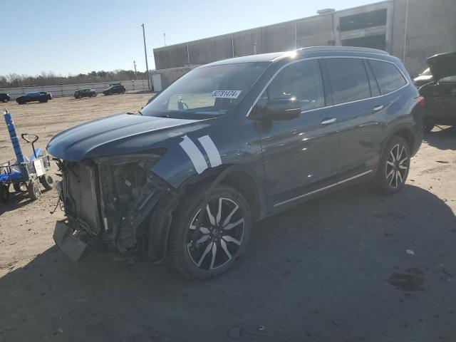 HONDA PILOT ELIT 2020 with VIN 5FNYF6H02LB064684 - Photo from auction