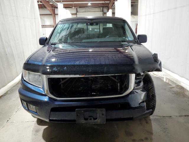 Photo 5 from auction – 2012 HONDA RIDGELINE with VIN 5FPYK1F57CB458105