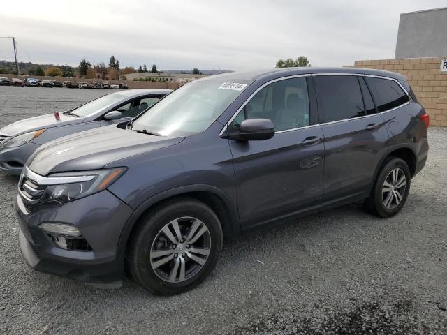 HONDA PILOT EX 2017 with VIN 5FNYF5H37HB017551 - Photo from auction