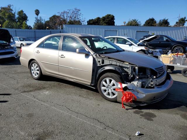 Photo 4 from auction – 2002 TOYOTA CAMRY LE with VIN JTDBE30K320119094