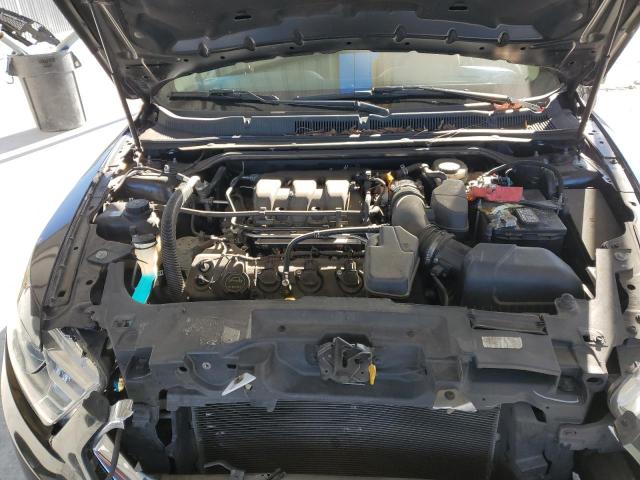 Photo 11 from auction – 2015 FORD TAURUS SEL with VIN 1FAHP2E87FG145521