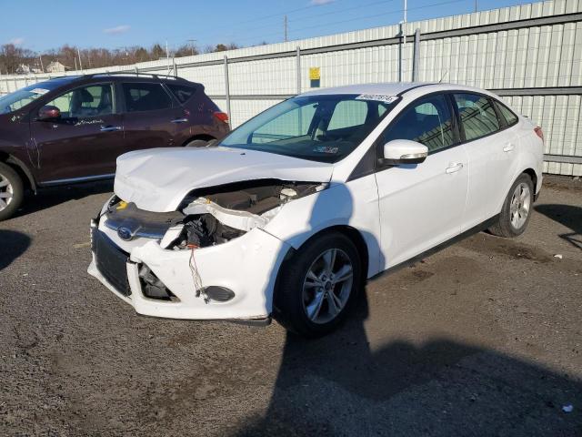 FORD FOCUS SE 2014 with VIN 1FADP3F25EL338531 - Photo from auction