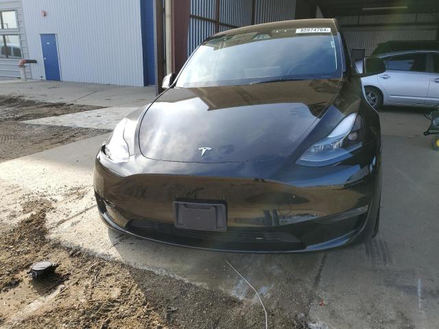 Photo 5 from auction – 2023 TESLA MODEL Y with VIN 7SAYGAEE7PF929111