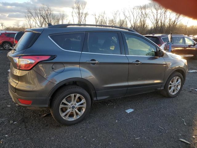 Photo 3 from auction – 2018 FORD ESCAPE SE with VIN 1FMCU9GD5JUA99256