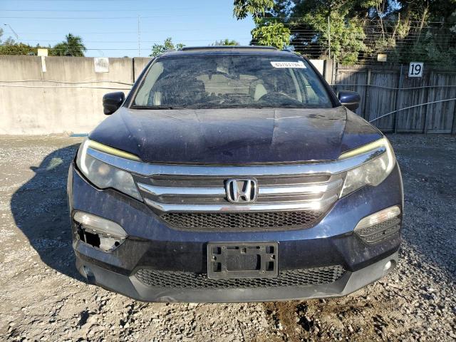 Photo 5 from auction – 2016 HONDA PILOT EXL with VIN 5FNYF6H59GB055580