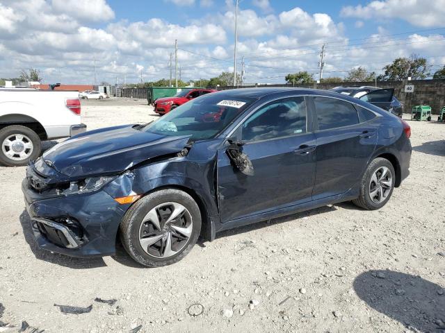 HONDA CIVIC LX 2019 with VIN 19XFC2F61KE050330 - Photo from auction