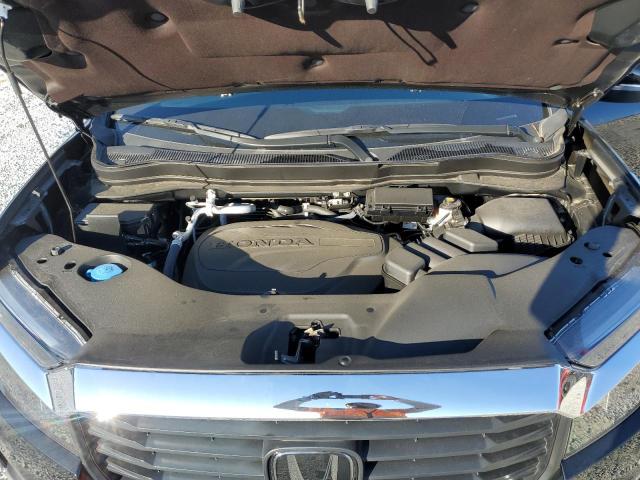 Photo 11 from auction – 2023 HONDA RIDGELINE with VIN 5FPYK3F59PB068849
