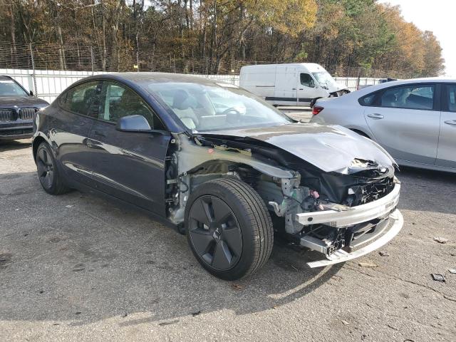 Photo 4 from auction – 2023 TESLA MODEL 3 with VIN 5YJ3E1EA7PF543637