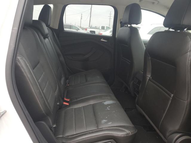Photo 11 from auction – 2014 FORD ESCAPE TIT with VIN 1FMCU9J94EUE24764