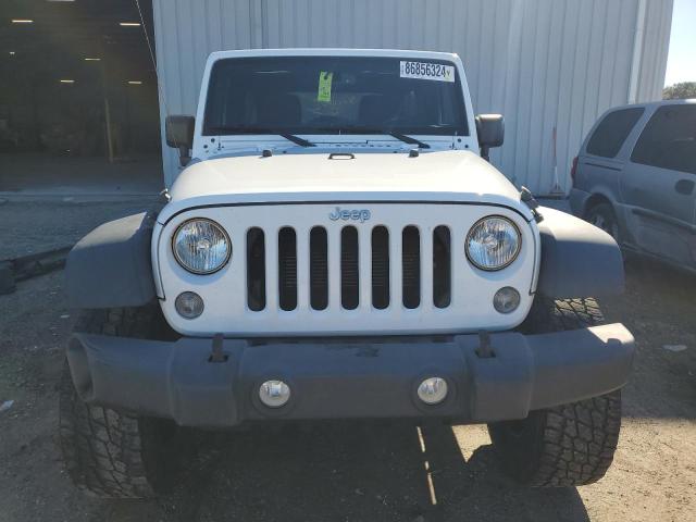 Photo 5 from auction – 2015 JEEP WRANGLER U with VIN 1C4BJWDG2FL542370