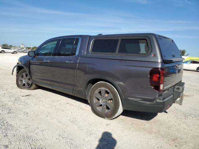 Photo 2 from auction – 2020 HONDA RIDGELINE with VIN 5FPYK3F76LB007258