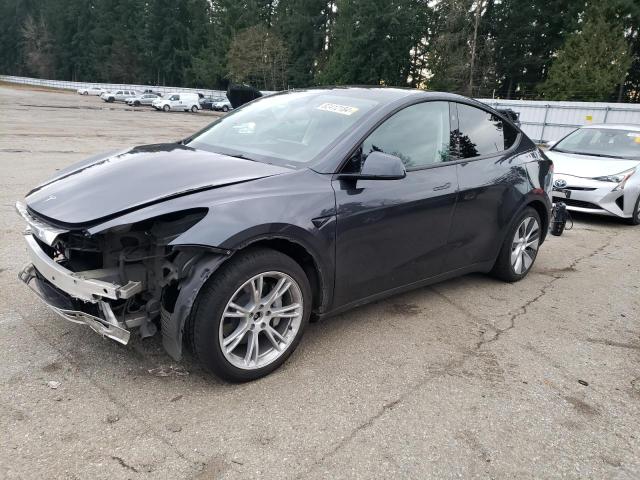 TESLA MODEL Y 2024 with VIN 7SAYGAEE2RF993818 - Photo from auction
