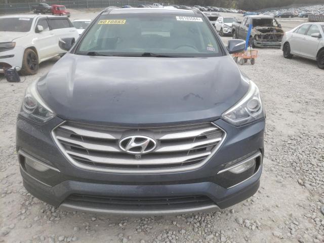 Photo 5 from auction – 2017 HYUNDAI SANTA FE S with VIN 5NMZU3LB0HH042139