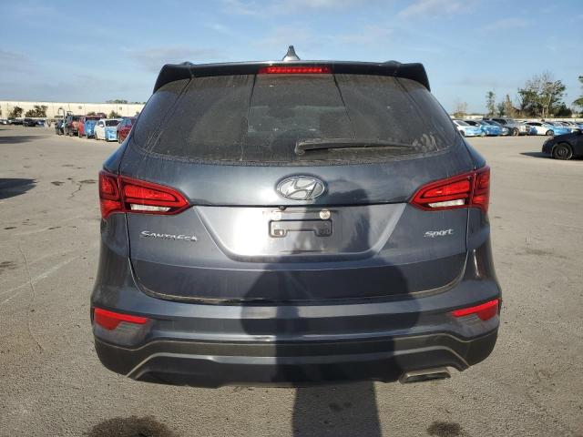 Photo 6 from auction – 2017 HYUNDAI SANTA FE S with VIN 5NMZU3LB0HH015328