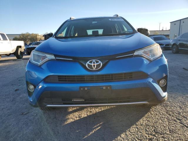 Photo 5 from auction – 2016 TOYOTA RAV4 XLE with VIN JTMRFREVXGJ068602