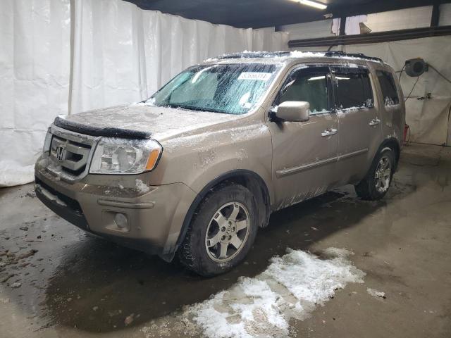 HONDA PILOT TOUR 2010 with VIN 5FNYF4H92AB002928 - Photo from auction