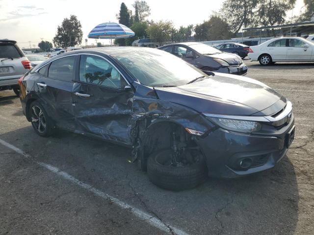 Photo 4 from auction – 2016 HONDA CIVIC TOUR with VIN 19XFC1F97GE219004