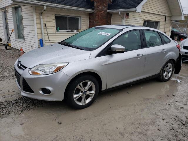 FORD FOCUS SE 2014 with VIN 1FADP3F24EL158943 - Photo from auction