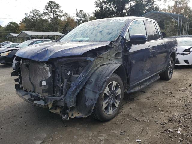 HONDA RIDGELINE 2017 with VIN 5FPYK3F76HB029879 - Photo from auction