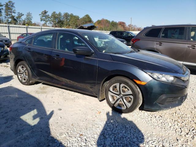 Photo 4 from auction – 2018 HONDA CIVIC LX with VIN 2HGFC2F56JH579459