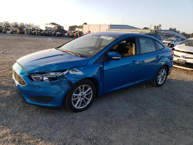 FORD FOCUS SE 2015 with VIN 1FADP3F20FL228438 - Photo from auction