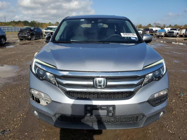 Photo 5 from auction – 2018 HONDA PILOT EXL with VIN 5FNYF5H67JB002287