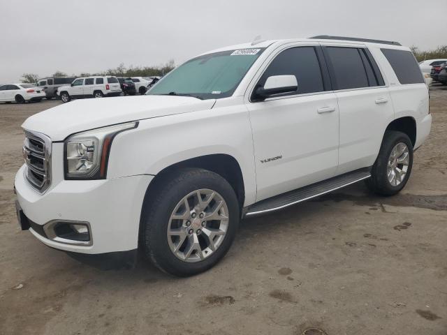 GMC YUKON SLE 2015 with VIN 1GKS1AKC8FR733084 - Photo from auction