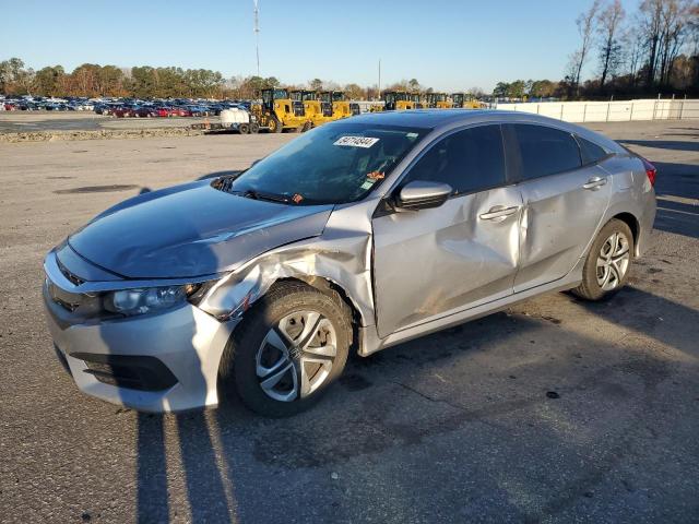 HONDA CIVIC LX 2018 with VIN 19XFC2F51JE201446 - Photo from auction