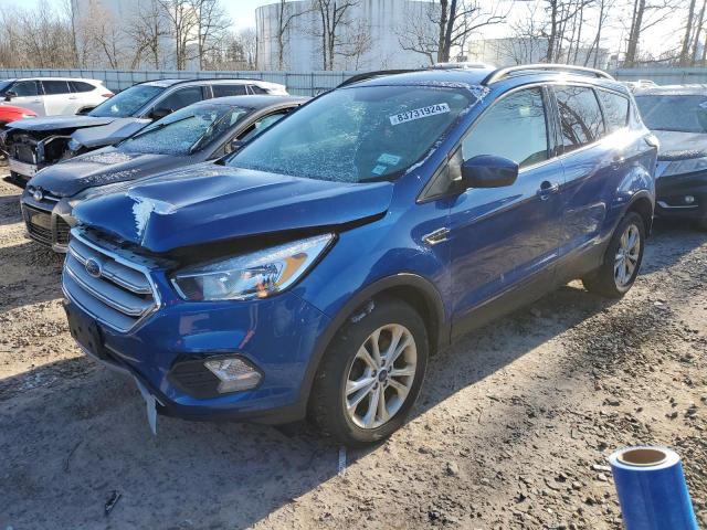 FORD ESCAPE SE 2018 with VIN 1FMCU9GD7JUC43759 - Photo from auction