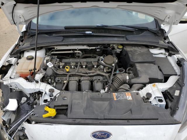 Photo 11 from auction – 2015 FORD FOCUS SE with VIN 1FADP3F23FL381962