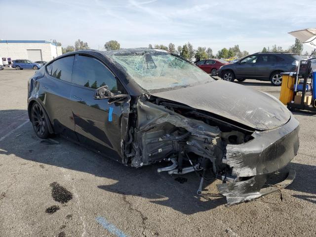 Снимка 4 от търг – 2021 TESLA MODEL Y с VIN 5YJYGDED2MF124330
