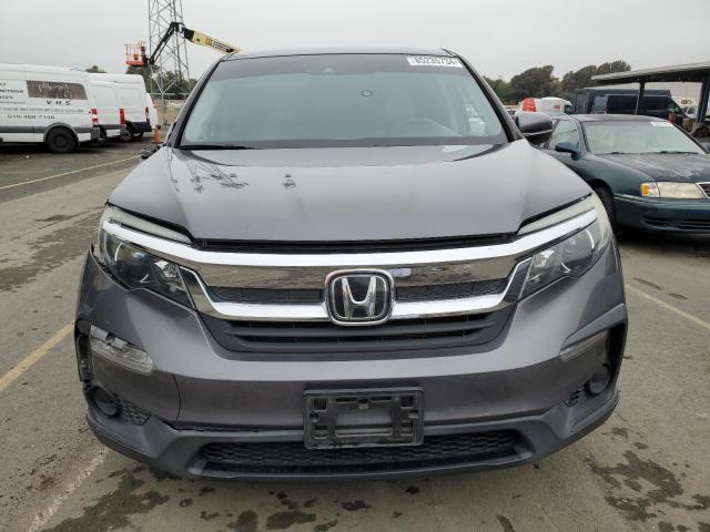 Photo 5 from auction – 2020 HONDA PILOT LX with VIN 5FNYF6H17LB027252