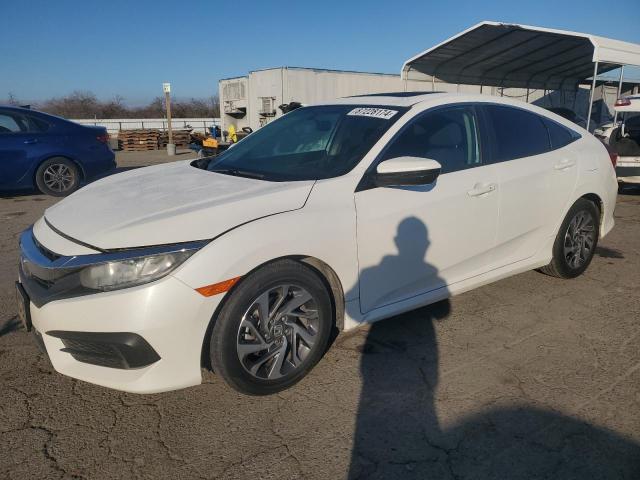 HONDA CIVIC EX 2018 with VIN 2HGFC2F79JH510959 - Photo from auction