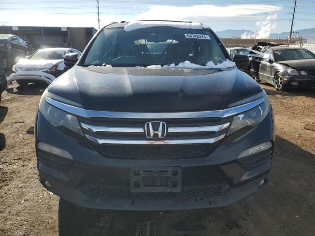 Photo 5 from auction – 2018 HONDA PILOT EXL with VIN 5FNYF6H59JB002028