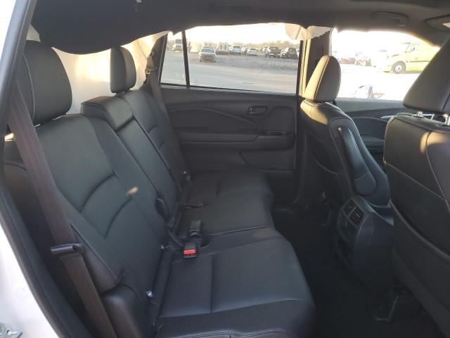 Photo 11 from auction – 2023 HONDA PASSPORT E with VIN 5FNYF8H58PB038362