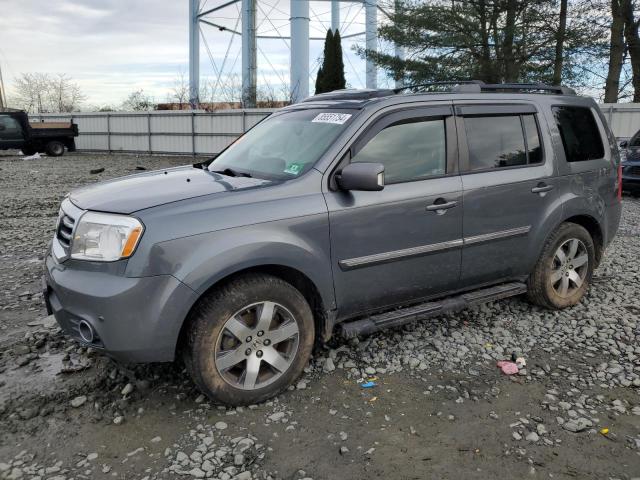 HONDA PILOT TOUR 2012 with VIN 5FNYF4H99CB028865 - Photo from auction