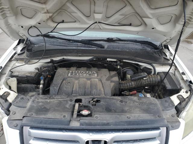 Photo 12 from auction – 2006 HONDA PILOT EX with VIN 5FNYF28586B015109